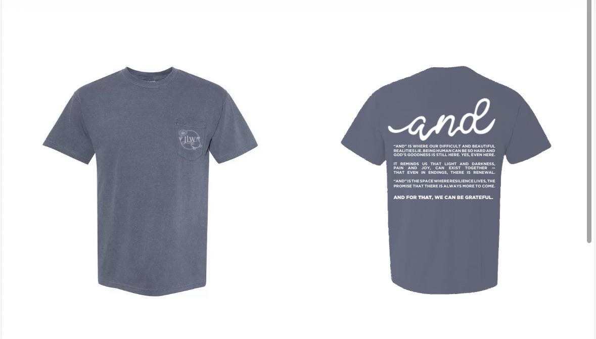 The “and” pocket tee in navy, front pocket logo and back message